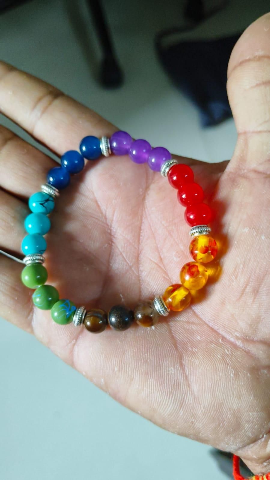 7 chakra bracelet close view showing natural stone beads and colors