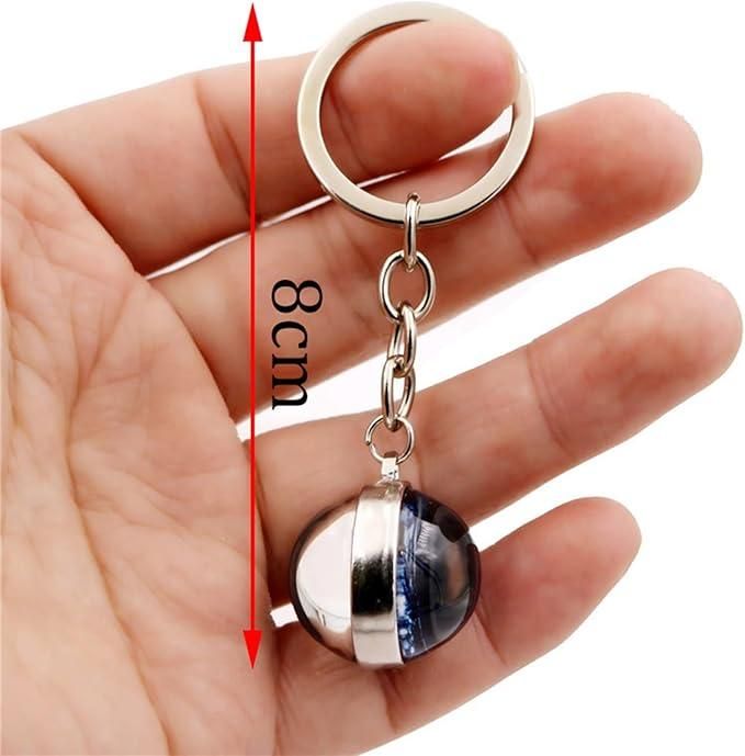 Hand holding a keychain with a measurement label indicating 8cm.