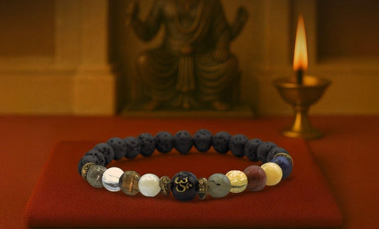 Handcrafted natural stone bead bracelet featuring a central Om charm