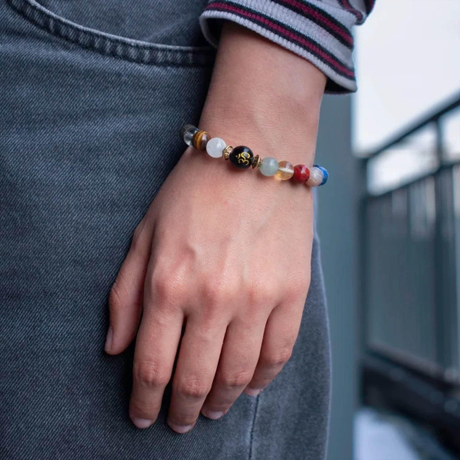 Handcrafted natural stone bracelet with an Om charm