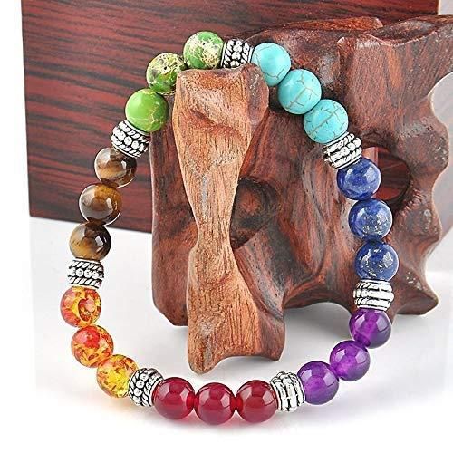 Multicolored beaded bracelet with silver accents on a wooden stand