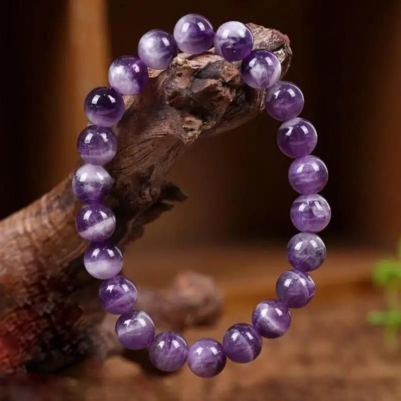 close up of amethyst crystal beads bracelet 8mm round stones